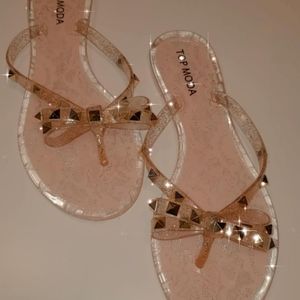 Clear glittery pink bow studded sandals